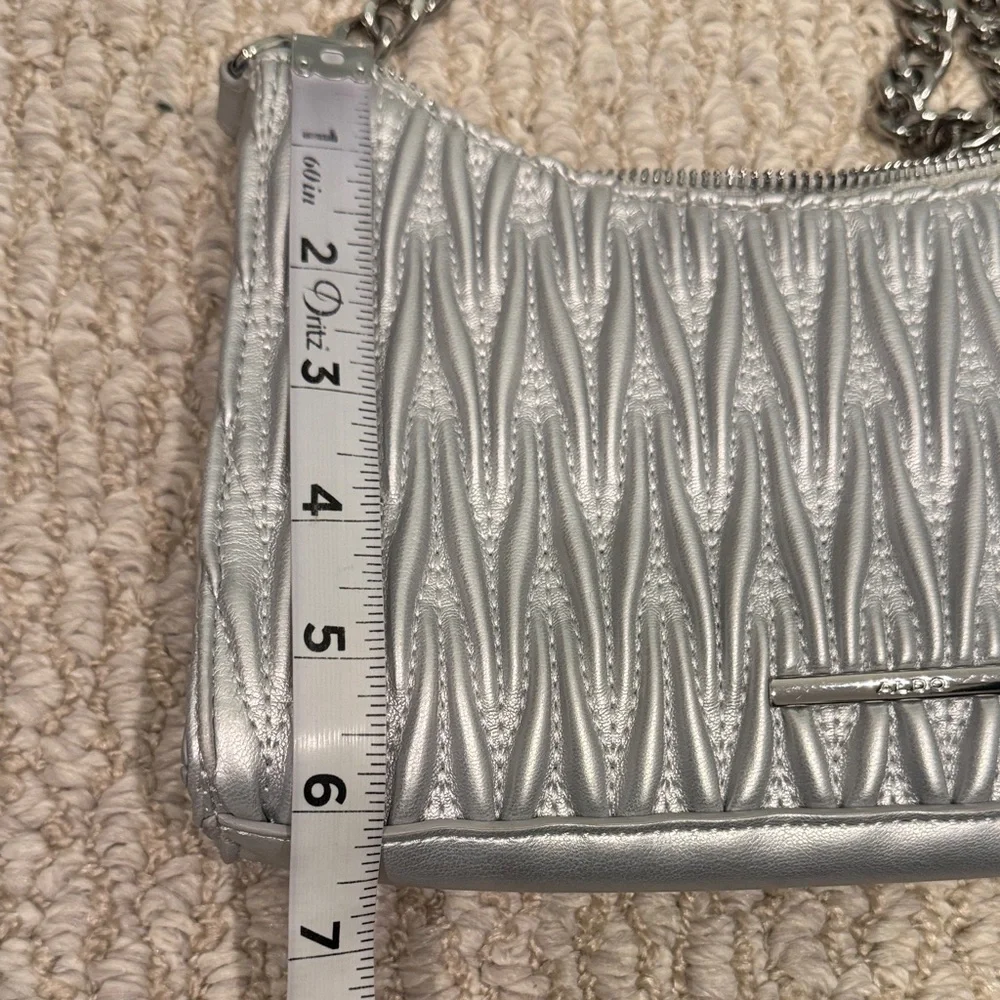 Aldo quilted silver Shoulder Bag with silver chain.